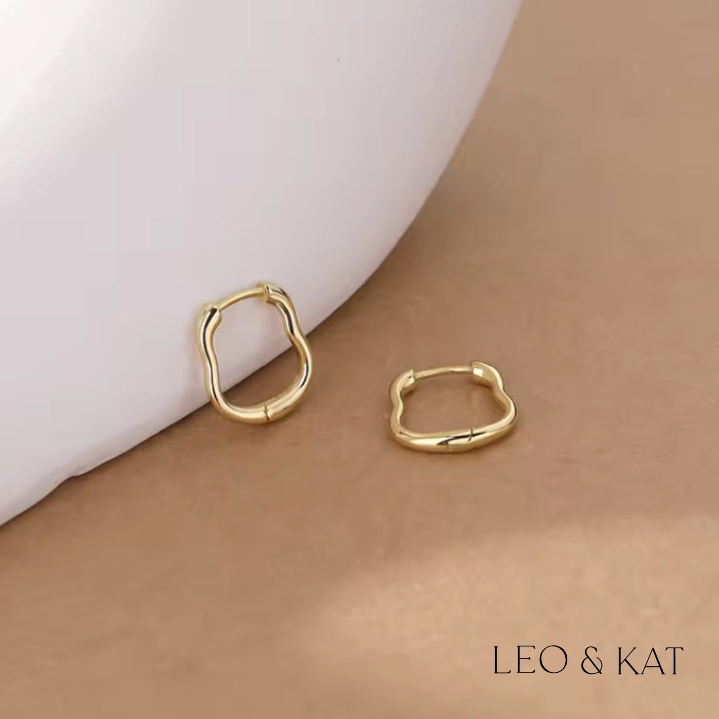 Gold Curvy Huggie Earrings