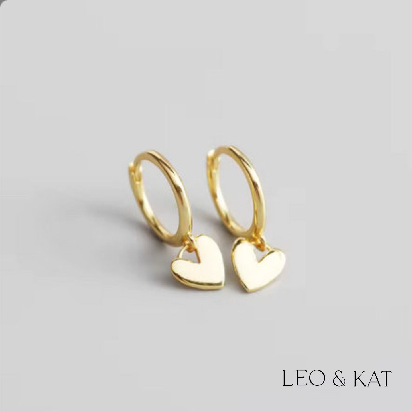 Gold Dangle Heart Huggie Earrings