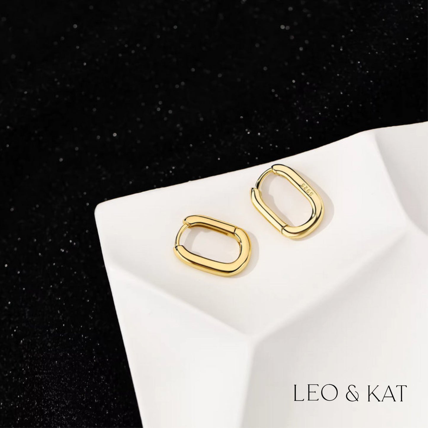 Rounded Rectangle Huggie Earrings in 18K Gold and Silver