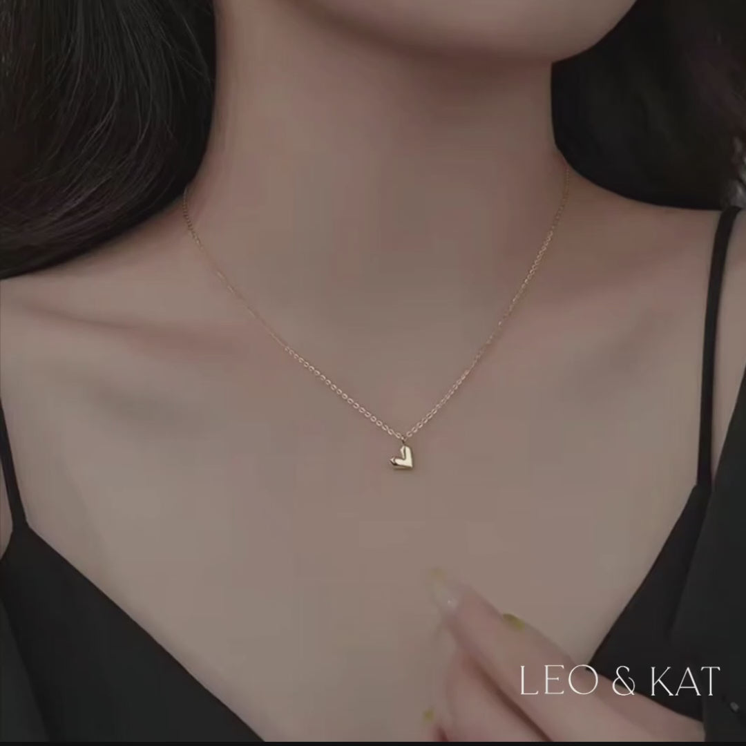 Load video: Comtemporary Gold Heart Necklace